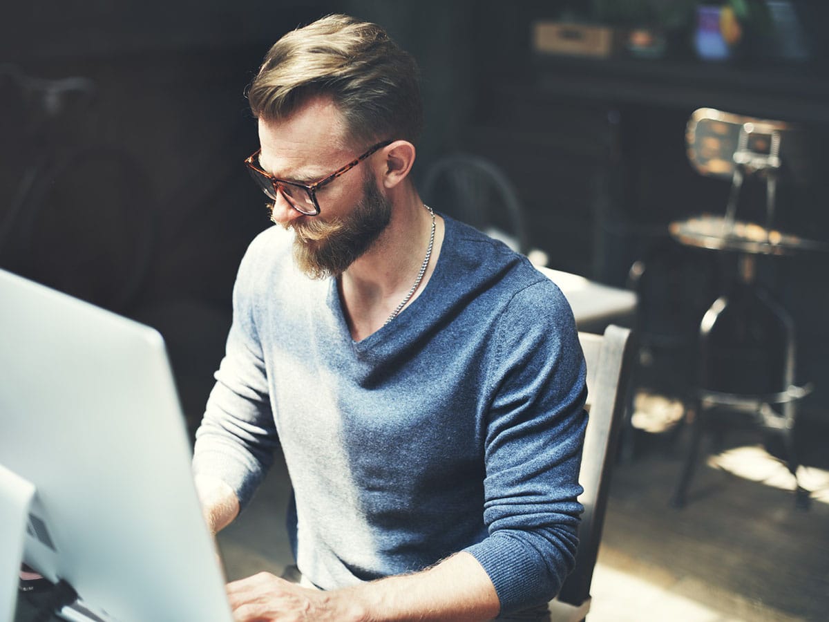 Man Working Determine Workspace Lifestyle Concept